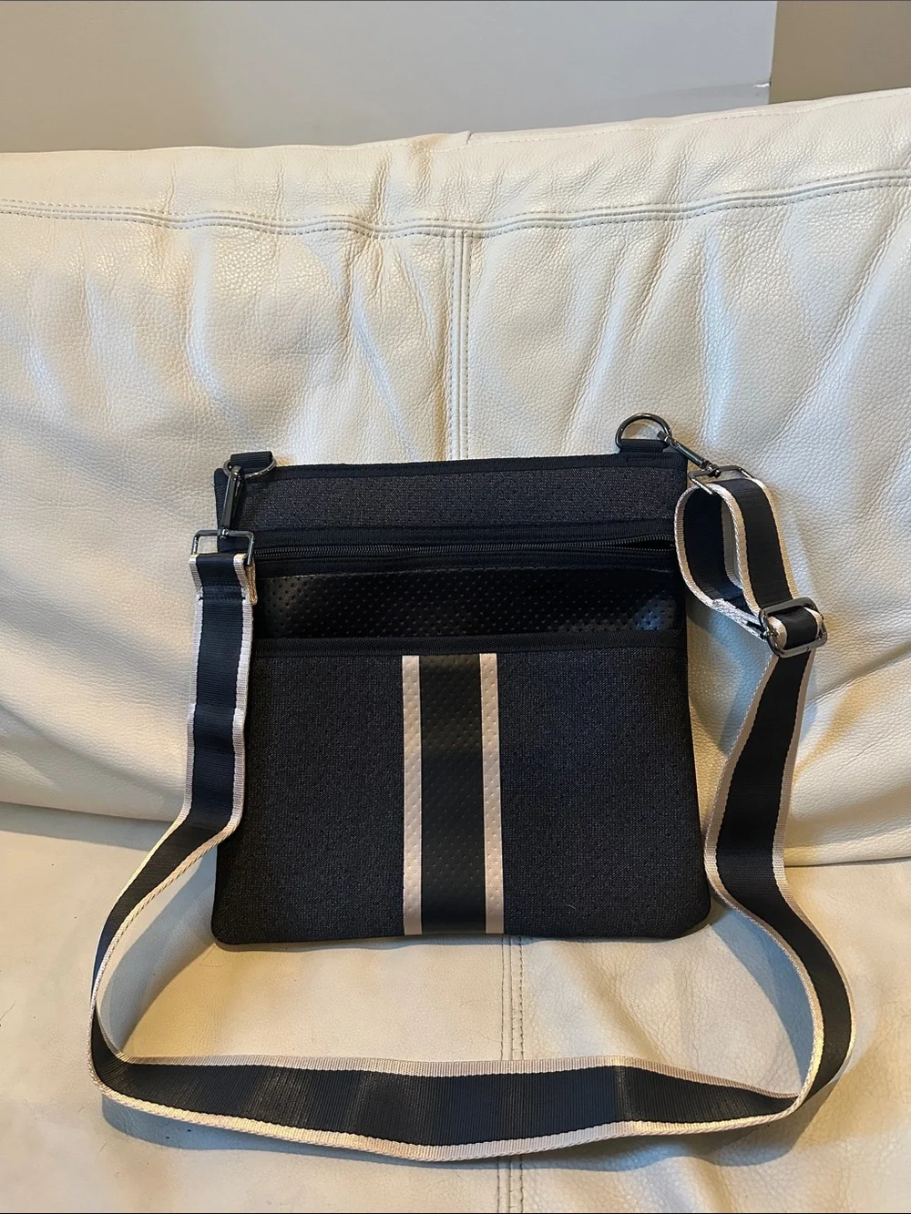 HAUTE SHORE Black Crossbody with Tan Striped Strap and Accents